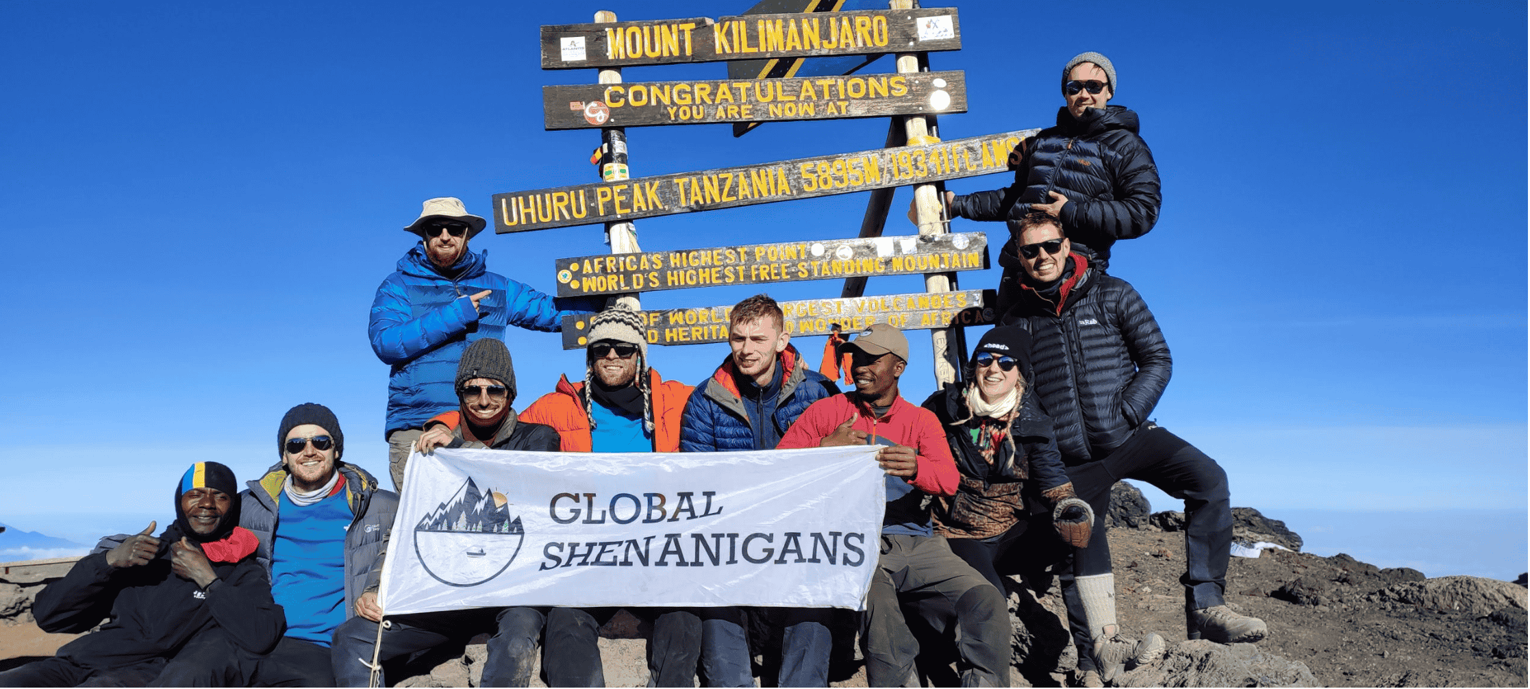 Hikers approaching Mount Kilimanjaro on the Machame Route